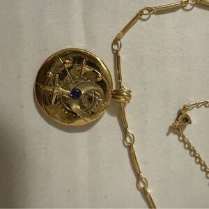 Gold Pendant Necklace with Blue Stone